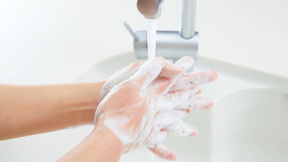 a person washing their hands demonstrates behaviors seen in ocd in teens.